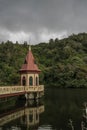 Historic pumphouse in the middle of a dam in Wellington