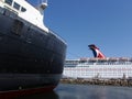 Historic Queen Mary Boat and Carnival Cruise Ship docked in Harbor Royalty Free Stock Photo