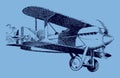 Historic racing plane in the air on a blue-grey background