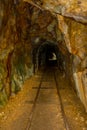 Historic rail tunnel, a part of an old gold mine transportation system located in North Island in New Zealand Royalty Free Stock Photo