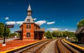 Historic railroad station, along train tracks Royalty Free Stock Photo