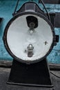 Historic railway lamp with light bulb and spare kerosene lamp and vasp Royalty Free Stock Photo