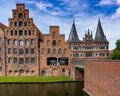 Historic red brick buildings and the Holstentor city gate in Luebeck