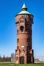 Historic red brick water tower built around 1900. Royalty Free Stock Photo