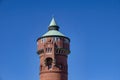 Historic red brick water tower built around 1900. Royalty Free Stock Photo
