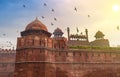 Historic Red Fort Delhi India built in the year 1639 made of red sandstone at sunrise with winter haze. Royalty Free Stock Photo