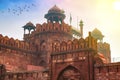 Historic Red Fort Delhi India built in the year 1639 made of red sandstone at sunrise with winter haze. Royalty Free Stock Photo