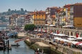 The lively Ribeira Waterfront, Porto, Portugal.
