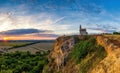 Historic roman church on the hill over village Drazovce near Nitra city at Slovakia and breathtaking colorful sunset Royalty Free Stock Photo