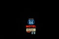 Historic Route 66 Motel sign on black background in Seligman, Arizona, USA Royalty Free Stock Photo