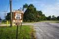 Historic Route 66 road sign in a stretch of the original road in the State of Kansas, USA Royalty Free Stock Photo