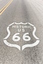 Historic Route 66 sign painted on asphalt of highway in Arizona - California Royalty Free Stock Photo