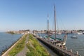 Historic sailing ship moored at pier of Dutch village Urk Royalty Free Stock Photo