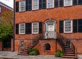 Historic Savannah Brick Townhouse with Wrought Iron Staircase and Shutters, a Classic Southern Architecture Gem Savannah Royalty Free Stock Photo