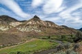 Historic Sheep Rock towers over the John Day River at the John Day Fossil Beds National Monument, Oregon, USA Royalty Free Stock Photo