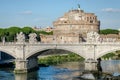 Historic sights of building architecture Castel Sant'Angelo in Rome, on the banks of the Tiber River near the arched bridge across Royalty Free Stock Photo