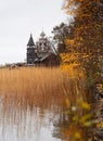 Historic site of wooden churches of Kizhi Island, Republic of Karelia, Russia. Onega lake autumn colorful landscape Royalty Free Stock Photo