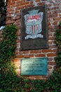 Historic St. Malo Beach sign on a brick wall, Oceanside California