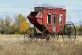 Historic Stage Coach sits in a field