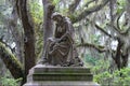 Historic Statue Monument of Woman Among Spanish Moss
