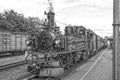 Historic steam powered railway train in black and white Royalty Free Stock Photo