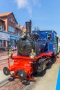 Historic steam train locomotive in the center of Borkum village