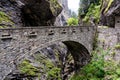 Historic stoen bridge crossing the deep Viamala Gorge in the Swiss Alps near Thusis Royalty Free Stock Photo