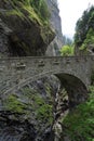 Historic stoen bridge crossing the deep Viamala Gorge in the Swiss Alps near Thusis Royalty Free Stock Photo