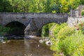 Historic stone bridge over river Elz in Monreal