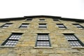 Vertical view of historic limestone stone building in Seneca Falls1844 Royalty Free Stock Photo