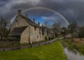 The historic stone cottages of Arlington Row in Bibury, Gloucestershire