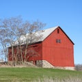 Historic NYS stone foundation red paint wood agriculture barn Royalty Free Stock Photo