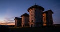 Historic Stone Tower Complex Silhouetted Against Twilight Sky During Sunset Hours Royalty Free Stock Photo