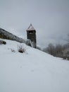 Historic stone tower in snow Royalty Free Stock Photo