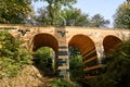 Historic Stone viaduct in the park Muskauer