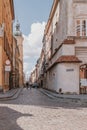 Historic street with old tenement houses in the Warsaw Old Town in Poland on a summer day