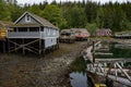 Historic Telegraph Cove buildings at low tide