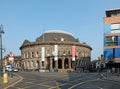 the historic 19th century corn exchange building in the kirkgate area of leeds with surrounding building and streets Royalty Free Stock Photo