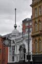 Historic time ball buildings in leeds with ornate clocks and statues