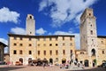 Historic towers and public cistern, Piazza della Cisterna, San Gimignano, Tuscany, Italy Royalty Free Stock Photo