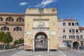 Historic town gate Porta Garibaldi o Torre Santa Maria on Corso del Popolo in Chioggia, Venice, Veneto, Italy