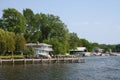 Historic town of Green Lake Wisconsin with houses and boats view of the lake