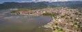 Panoramic aerial view to historic town Paraty and harbour, green mountains in background, sunny day, Unesco World Heritage, Brazil