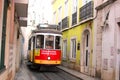 Historic tram no. 28 in alfama, lisbon, portugal