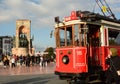 A historic tram on Taksim square. Beyoglu. Istanbul. Turkey