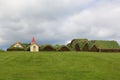 Historic turf houses in Glaumbaer farm in under overcast sky in Skagafjordur, North Iceland Royalty Free Stock Photo