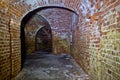Historic underground passage under the abandoned fort Royalty Free Stock Photo