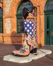 Historic Union Pacific Railroad train depot, a historic landmark, and it statue and boot adornments in Cheyenne, Wyoming