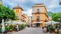 Historic village of Cefalu with terrace, bar and restaurant in Sicily, Italy