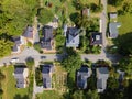 Historic village near Washington. Roads and roofs of houses surrounded by greenery. View from a drone